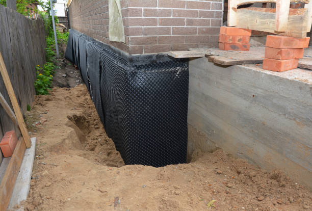 SJ Waterproofing Pros technician performing targeted Waterproofing assessment in Clarkston, GA